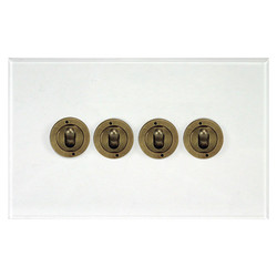 Prism Dolly Switch 4 gang 20 amp 2 way Antique Brass / Clear Perspex