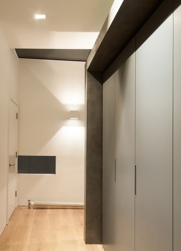 Wall light and downlight in corridor
