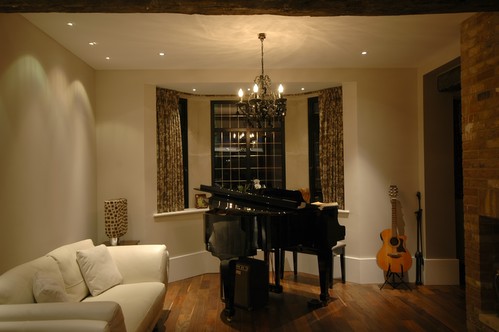 Chandelier above piano