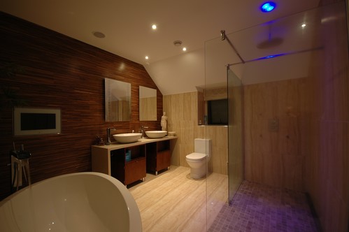 Illuminated mirrors and colour changing downlight