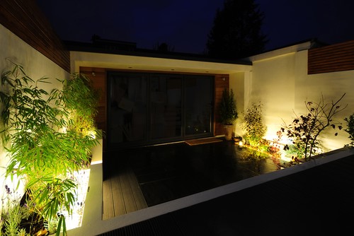 LED tape in flower beds and spotlights