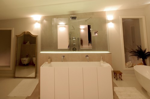 Plaster wall lights in bathroom