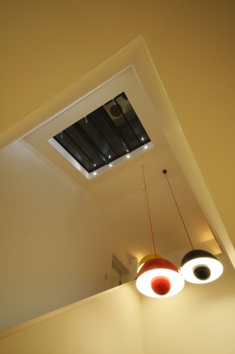 Pendants with bubble LEDs in skylight