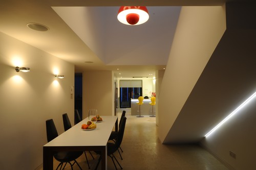 Wall lights and LED tape under stairs