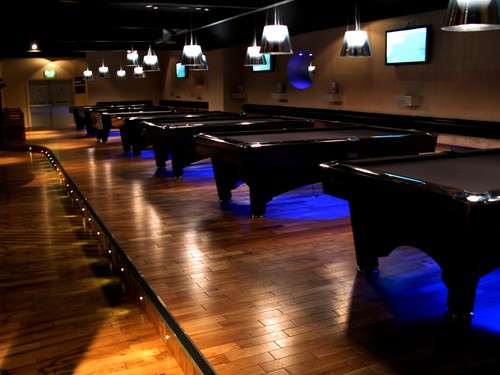 K Tribe pendants above pool tables