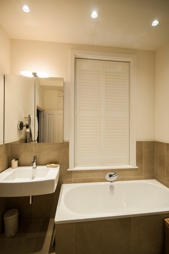 Trimless downlights in bathroom