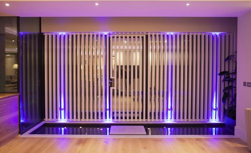 Blue uplights in living area