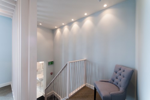 Trimless downlights above staircase