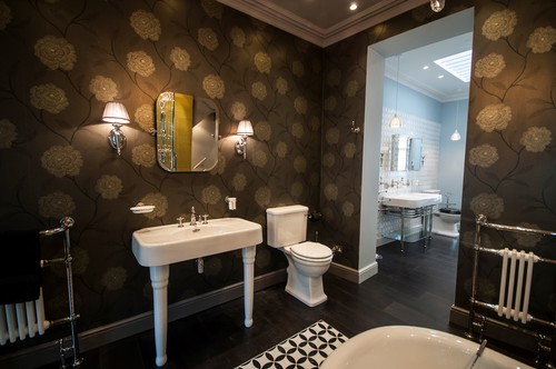 Wall lights beside mirror
