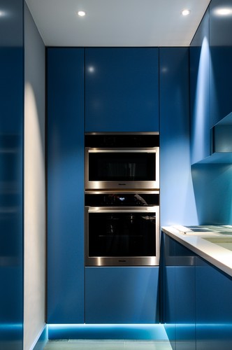 Elegant downlights and LED tape under cabinet 