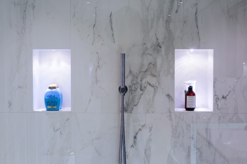 Feature lighting in recessed bathroom shelfing 