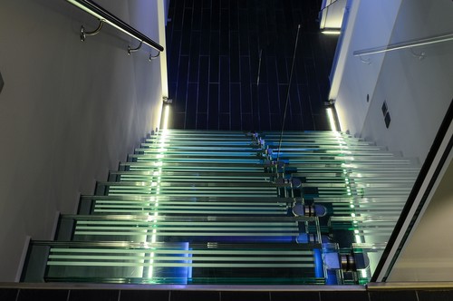 Recessed floor profile under staircase