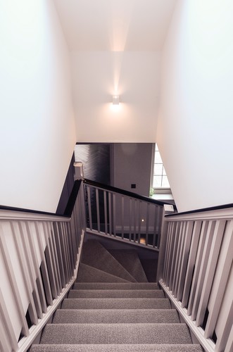 Cube wall light on staircase