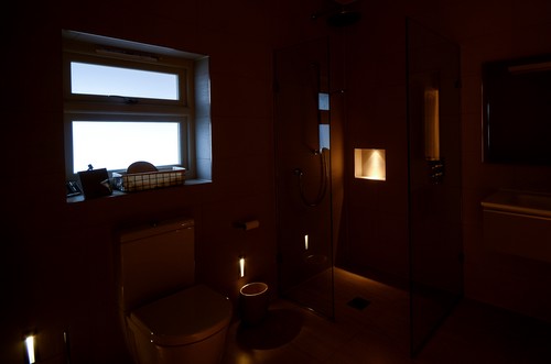 Lighting of recessed shower shelf
