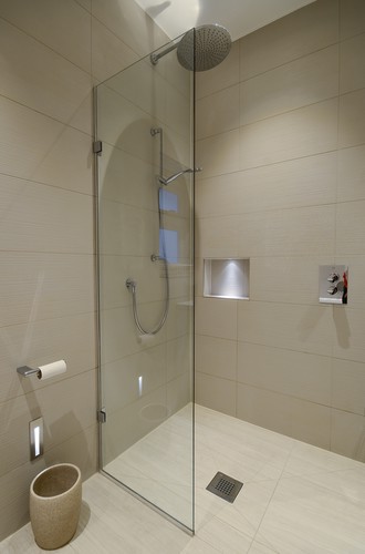 Lighting of recessed shower shelf