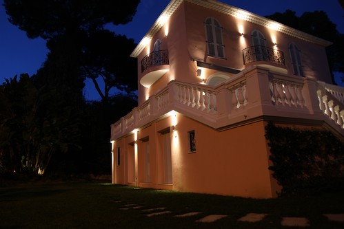 Pillar lights lighting exterior of villa