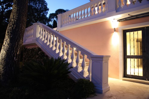 Pillar lights lighting exterior of villa