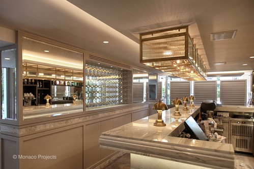 Decorative ceiling lights over bar area