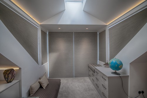 Bedroom with LED tape in MDF extrusions and downlights