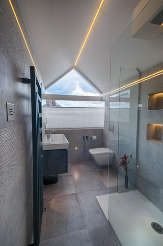 Ensuite bathroom with LED tape and extrusions, low level lights and coving