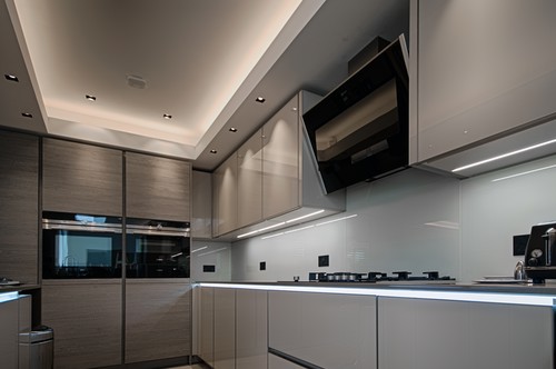 Kitchen with LED tape in lowered ceiling and under counter and cabinets