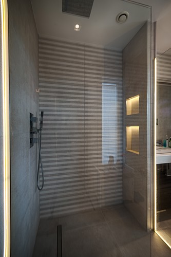 LED tape and trimless downlights in shower