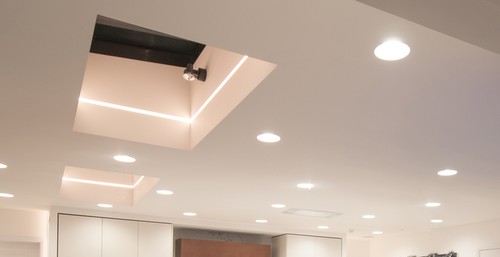 Living room ceiling and skylight with downlights and recessed LED tape