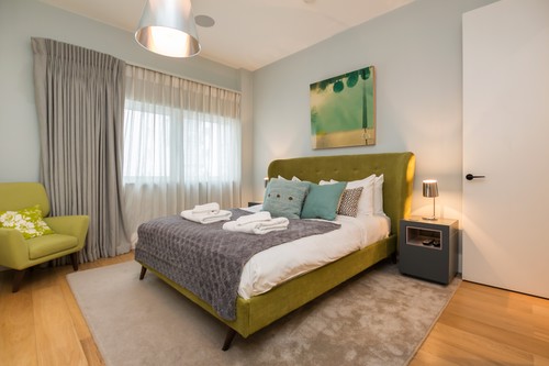 K Tribe Pendant in bedroom with table lights