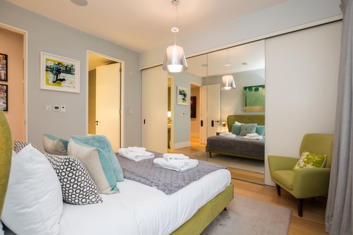 K Tribe Pendant in bedroom with table lights