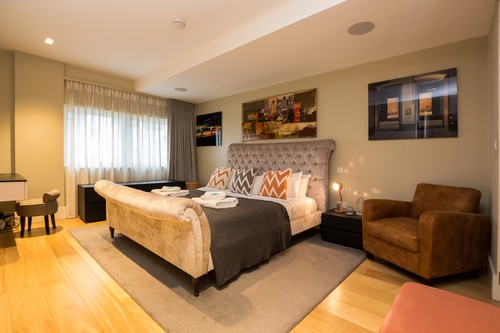 Rock n Roll square downlights with Reality LED lamps and table lights in bedroom