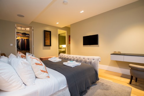 Rock n Roll square downlights with Reality LED lamps and table lights in bedroom