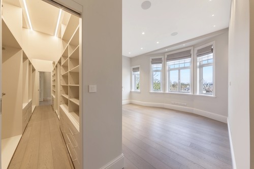 Bedroom with walk in wardrobe
