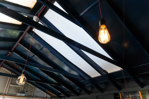 Filament lamps over dining area