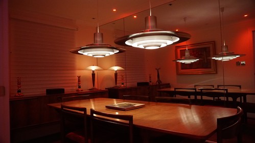 Retro pendants with RGBW downlights in dining room