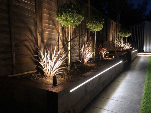 Tape Extrusion recessed in to flower beds