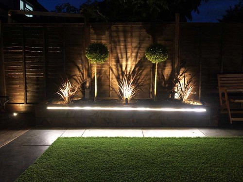 Tape Extrusion recessed in to flower beds