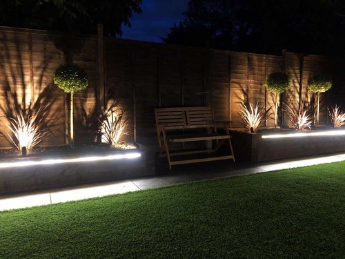 Tape Extrusion recessed in to flower beds