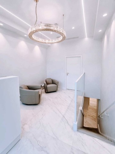 Trimless downlights with plaster in extrusions in ceiling