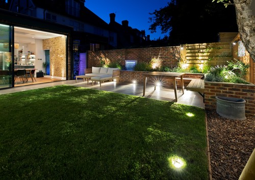 Recessed uplights in garden