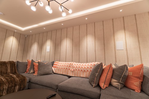 Basement detail Pendant light downlights and LED Tape over the sofa