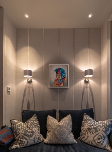 Wall lights on the hallway over the sofa 