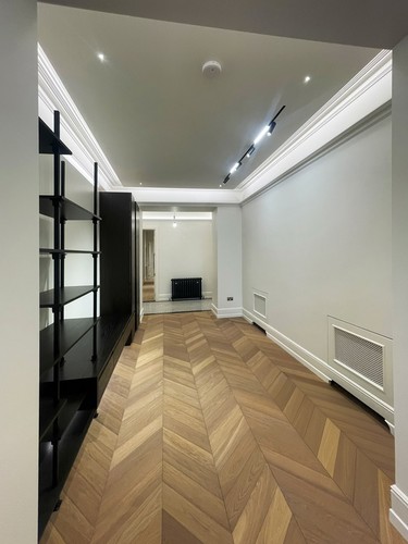 Hallway with tape in coving and LED track system