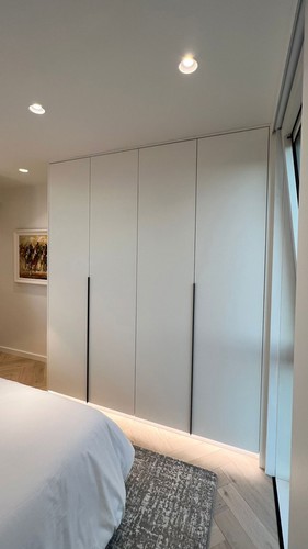 Trimless downlights and LED tape in bedroom